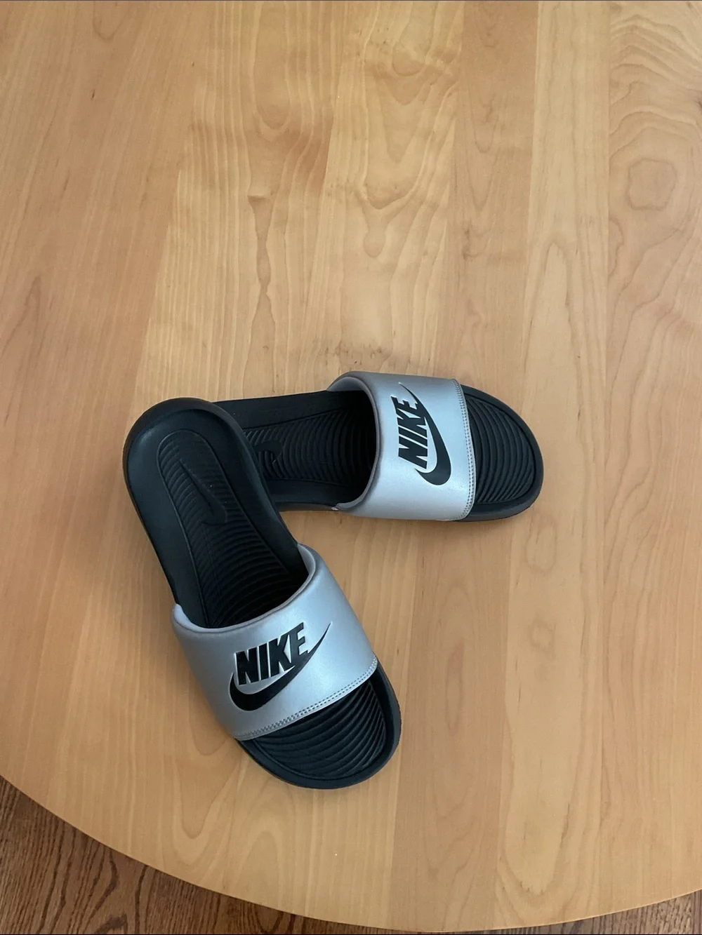 Nike Silver and Black Slide Sandals with Bold Logo